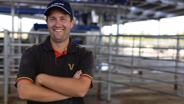Kevin in front of his 6 DeLaval VMS™ V310