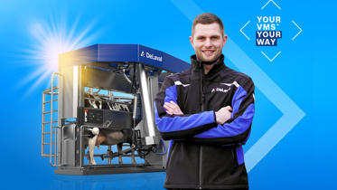 DeLaval VMS™ milking robot in operation with cow inside the unit